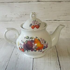Adorable White Ceramic Teapot
